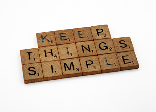 Stock image of letter blocks spelling "Keep Things Simple"